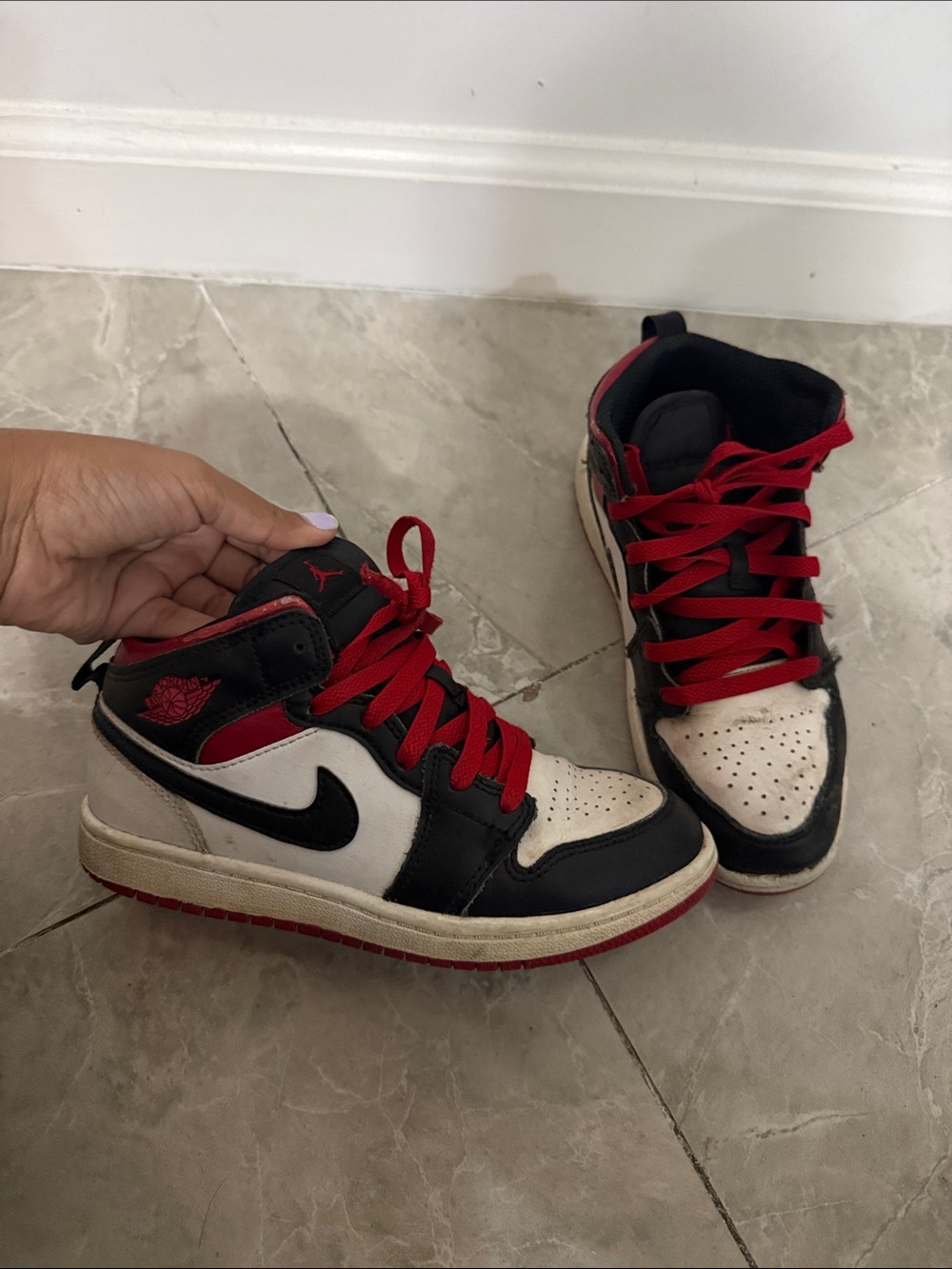 Kids Jordan 1s Black, White & Red High-Top Sneakers
